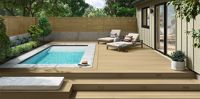 deck with a pool and chairs